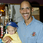 IMAGE: Tony Dungy and child