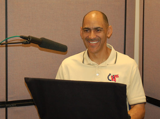 Coach enjoying the audio taping of his new book Quiet Strength