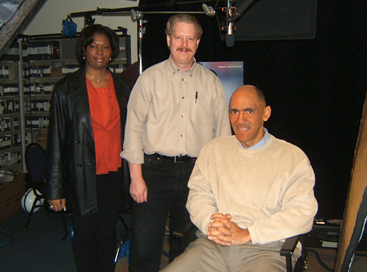 Yolanda Sidney (Marketing Manager - Tyndale House Publishers), Alan Huizenga, on the set with Coach Dungy