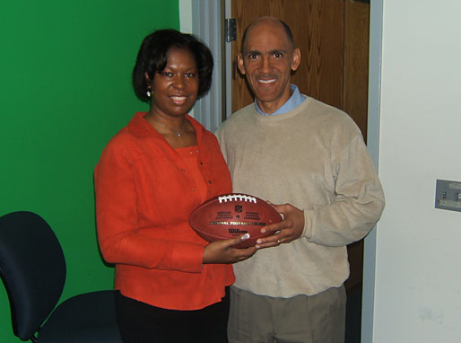 Yolanda Sidney passing the ball to Coach Dungy