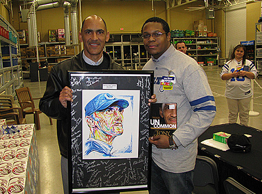 Tony with Theoplis Smith III, the artist of this drawing of Mr. Dungy.