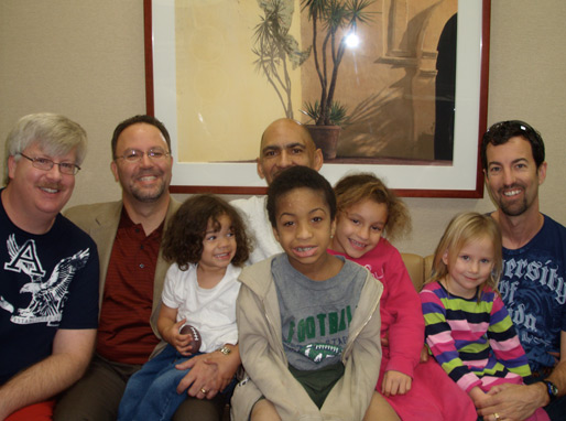 Tony Dungy (with his children), Nathan Whitaker (with his daughter) visiting WTBN in Tampa!