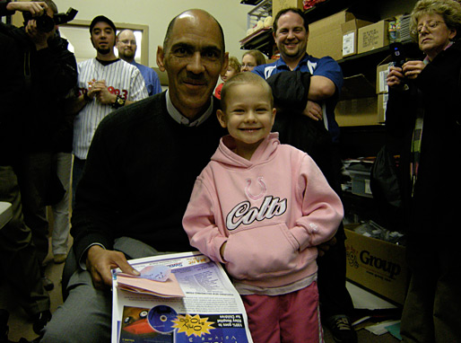 Basket of Hope recipient Aleigha was excited to give Tony a hug and a card she made for him at the Family Christian Bookstore in Fort Wayne. - © All rights reserved. Photo by Jessica Atteberry Quinn