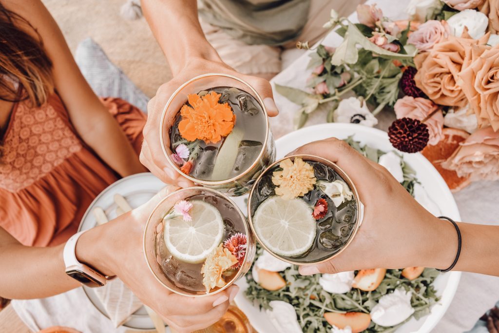 Friends sharing drinks