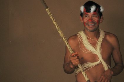 huaorani leader holding hunting spear