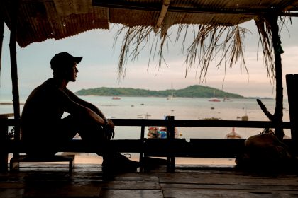 man sitting in cottage