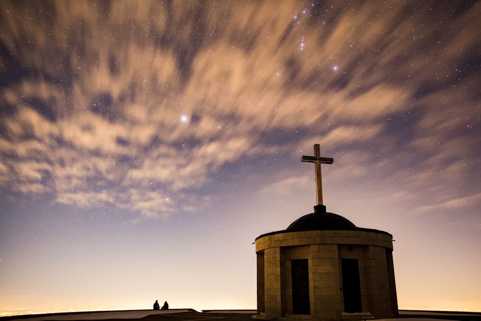 church next to angle of sky with clouds