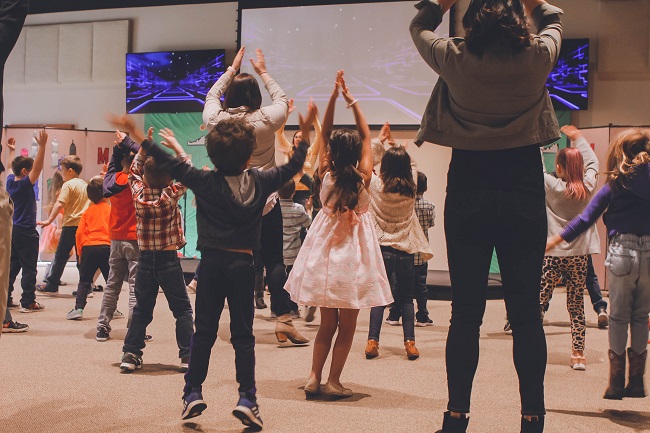 Children fill a floor doing co-ordinated dance moves in Sunday school. Could your spiritual gifts be used in your church?