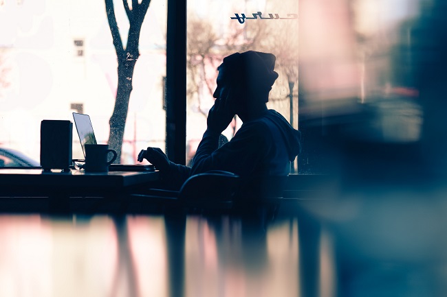 A young man sits in a cafe with his computer, mhis head resting on one hand. praying can be, or seem, tough. But it's actually really simple.