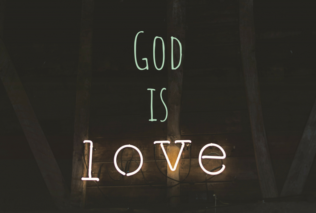 Neon sign that says 'God is love'.