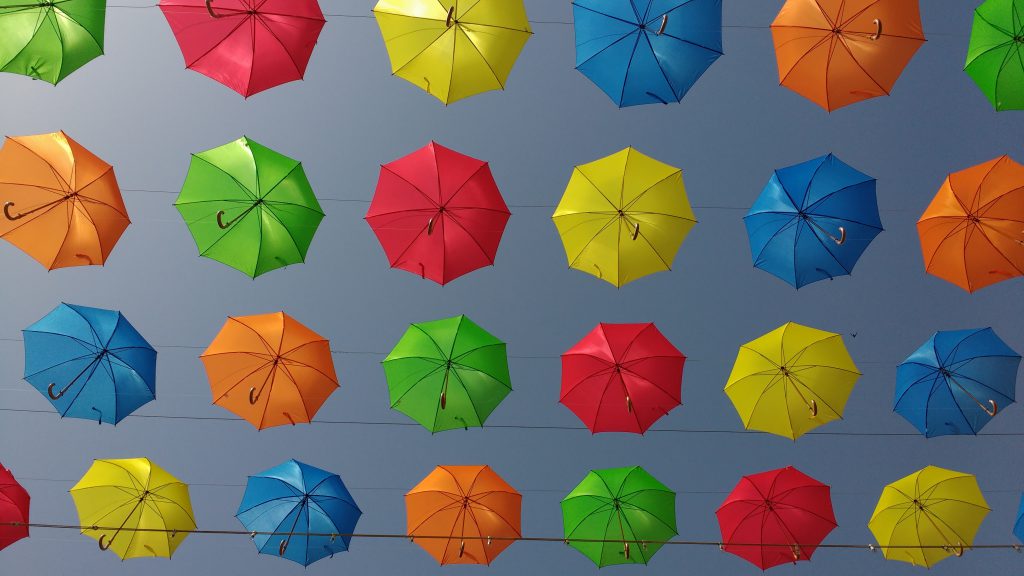 Colorful umbrellas, depicting joy. Related to the Hope devotional for new believers.