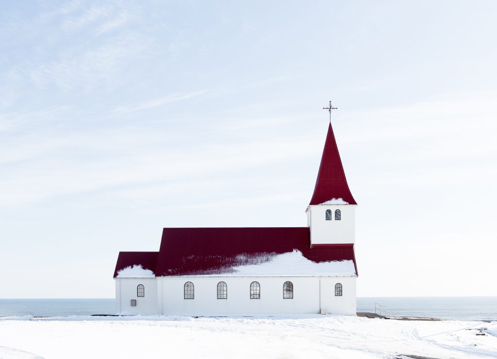 A wintery church in the snow. Church attendance at Christmas is of vital importance to all Christians.