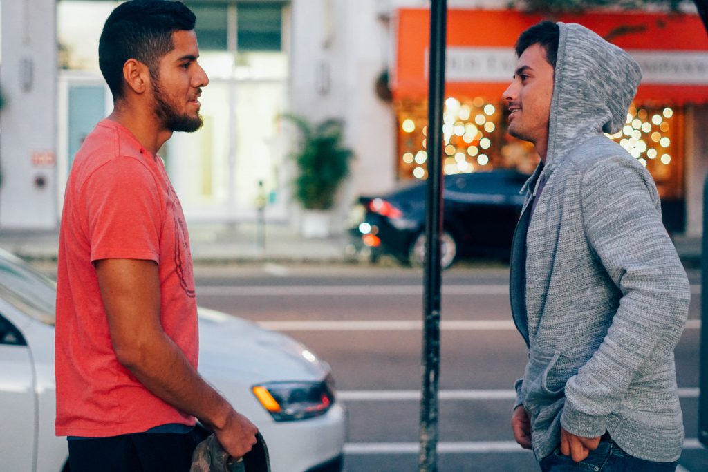 Two young men on a street talk candidly about Jesus and God's saving grace. Learning how to talk about Jesus is something we can all easily do.