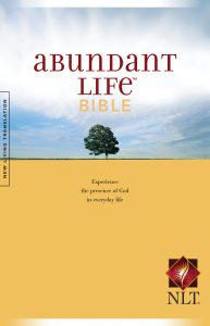 Front cover image of the Abundant Life Bible in New Living Translation. This Bible helps new believers to find the fullness of life offered in a relationship with Jesus. From this week's episode of Unfolding Stories, our new Christian testimony podcast.